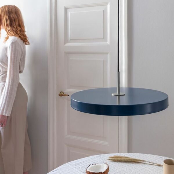 Umage Asteria Pendant light blue with woman in background