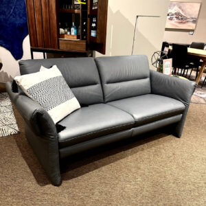 Clearance leather German sofa modern from Forma Furniture located in fort Collins colorado seen here in grey aqua
